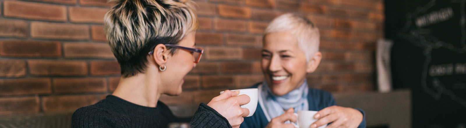 Middle aged woman having coffee.