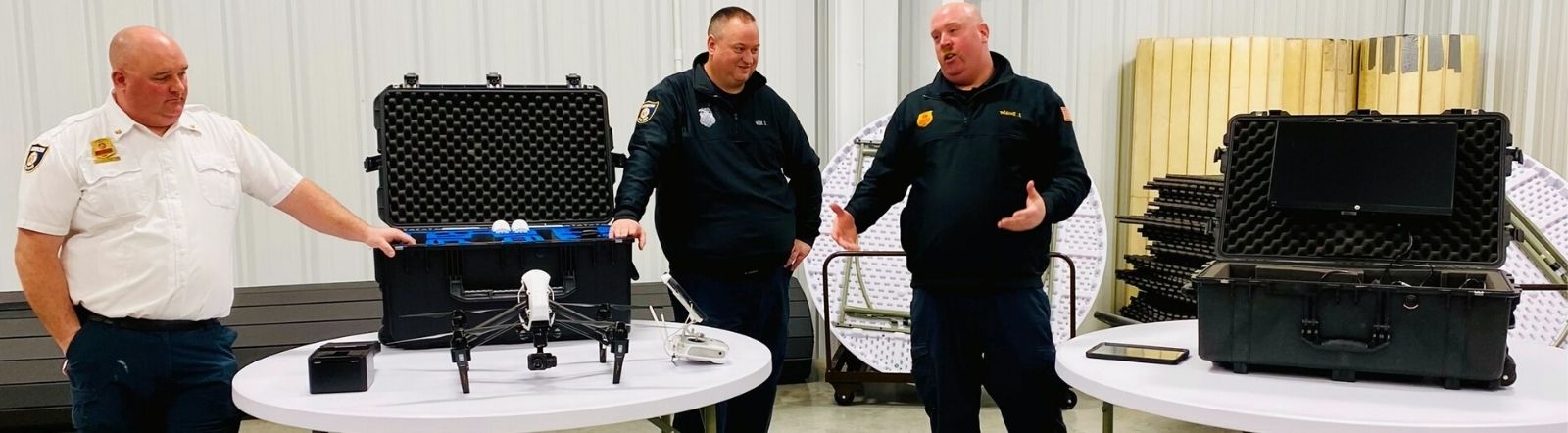 team of firefighters explain how drones are used in missions
